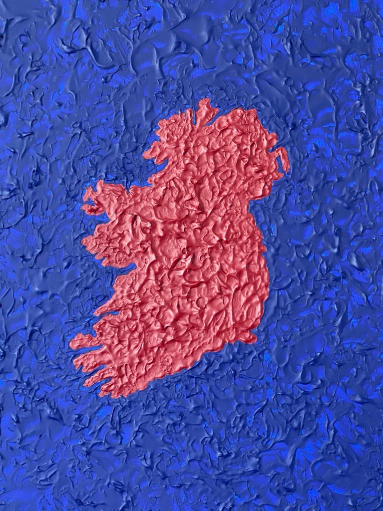 the island of ireland surrounded by a deep sea of acrylic paint - up close to show the texture
